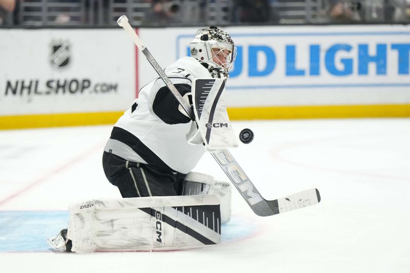 Apr 13, 2024; Los Angeles, California, USA; LA Kings goaltender David Rittich (31) makes a save against the Anaheim Ducks in the third period at Crypto.com Arena. Mandatory Credit: Kirby Lee-USA TODAY Sports