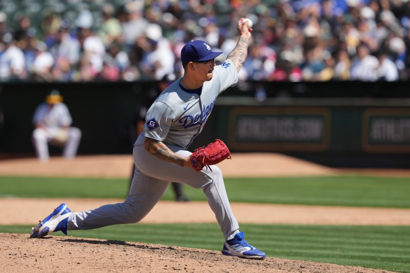 Aug 4, 2024; Oakland, California, USA; Los Angeles Dodgers relief pitcher Anthony Banda (43) throws a pitch against the Oakland Athletics during the ninth inning at Oakland-Alameda County Coliseum. Mandatory Credit: Darren Yamashita-USA TODAY Sports