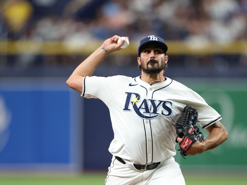 Jul 10, 2024; St. Petersburg, Florida, USA;  Tampa Bay Rays pitcher Zach Eflin (24) throws a pitch against the New York Yankees in the second inning at Tropicana Field. Mandatory Credit: Nathan Ray Seebeck-USA TODAY Sports