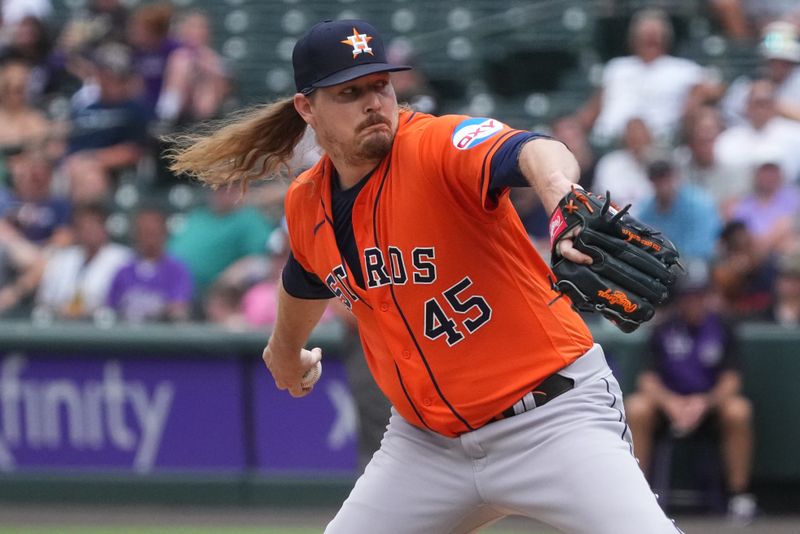 Jul 19, 2023; Denver, Colorado, USA; Houston Astros relief pitcher Ryan Pressly (55) delivers a pitch in the eighth inning against the Colorado Rockies at Coors Field. Mandatory Credit: Ron Chenoy-USA TODAY Sports