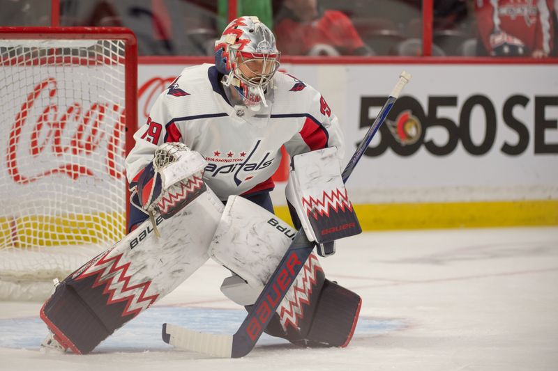 Oct 20, 2022; Ottawa, Ontario, CAN; Washington Capitals goalie Charlie Lindgren (79  follows the puck during warmup prior to game against the  Ottawa Senators at the Canadian Tire Centre. Mandatory Credit: Marc DesRosiers-USA TODAY Sports