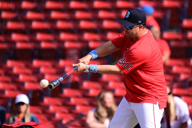 Jun 16, 2024; Boston, Massachusetts, USA;  Boston Red Sox bench coach Ramon Vazquez (60) warms up the team before a game against the New York Yankees at Fenway Park. Mandatory Credit: Eric Canha-USA TODAY Sports