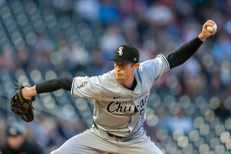 Apr 22, 2024; Minneapolis, Minnesota, USA; Chicago White Sox pitcher Tim Hill (54) delivers a pitch against the Minnesota Twins in the fourth inning at Target Field. Mandatory Credit: Jesse Johnson-USA TODAY Sports