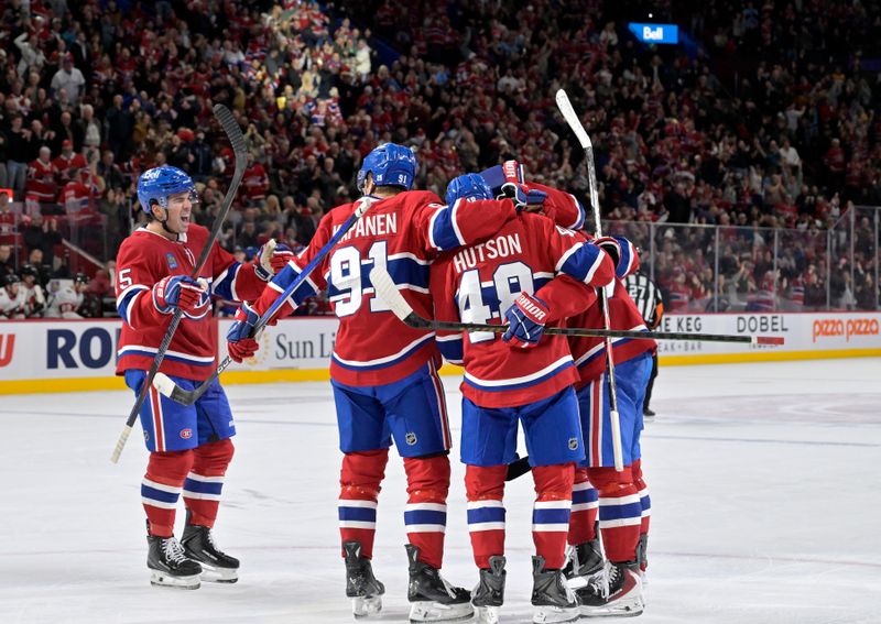 Nov 1, 2025; Montreal, Quebec, CAN; Montreal Canadiens forward Ivan Demidov (93) celebrates with teammates including forward Alex Newhook (15) after scoring a goal against the Ottawa Senators during the third period at the Bell Centre. Mandatory Credit: Eric Bolte-Imagn Images
