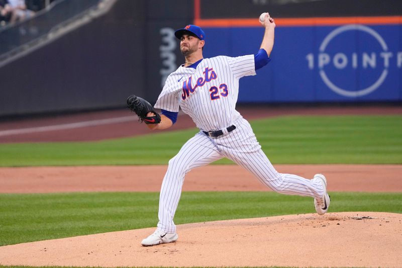 Jul 2, 2023; New York City, New York, USA; New York Mets pitcher David Peterson (23) delivers a pitch against the San Francisco Giants during the first inning at Citi Field. Mandatory Credit: Gregory Fisher-USA TODAY Sports