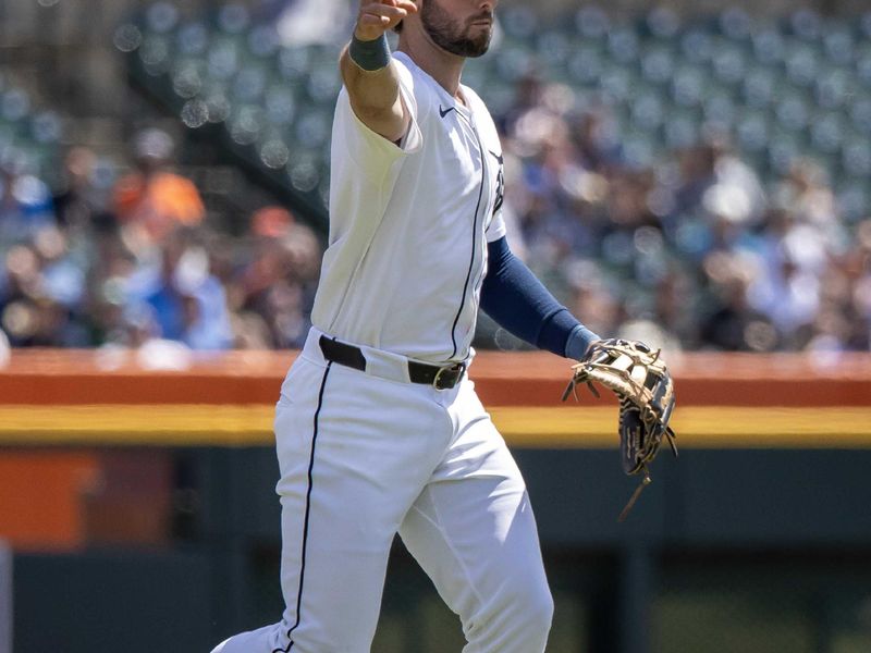 Apr 26, 2024; Detroit, Michigan, USA; Detroit Tigers outfielder Matt Vierling (8) makes a throw to first base for an out against the Kansas City Royals at Comerica Park. Mandatory Credit: David Reginek-USA TODAY Sports