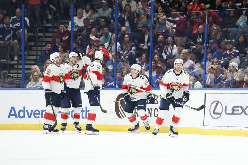 Feb 17, 2024; Tampa, Florida, USA;  Florida Panthers center Sam Bennett (9) celebrates after scoring a goal against the Tampa Bay Lightning in the first period at Amalie Arena. Mandatory Credit: Nathan Ray Seebeck-USA TODAY Sports