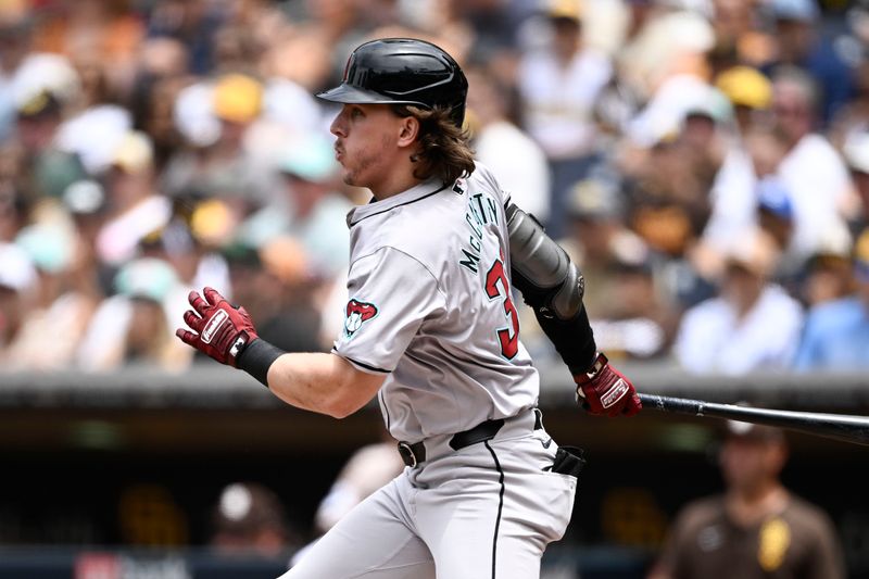 Jun 9, 2024; San Diego, California, USA; Arizona Diamondbacks right fielder Jake McCarthy (31) hits a single during the first inning against the San Diego Padres at Petco Park. Mandatory Credit: Denis Poroy-USA TODAY Sports at Petco Park. 