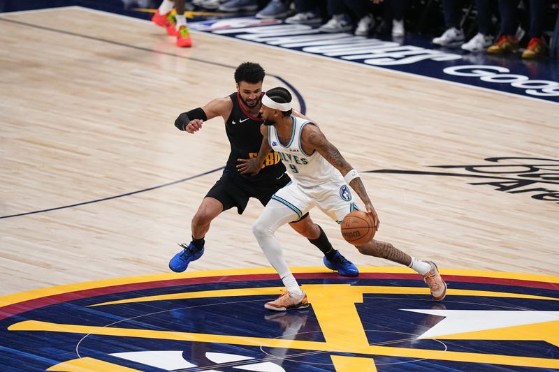 DENVER, CO - MAY 19: Nickeil Alexander-Walker #9 of the Minnesota Timberwolves handles the ball during the game  against the Denver Nuggets during Round 2 Game 7 of the 2024 NBA Playoffs on May 19, 2024 at the Ball Arena in Denver, Colorado. NOTE TO USER: User expressly acknowledges and agrees that, by downloading and/or using this Photograph, user is consenting to the terms and conditions of the Getty Images License Agreement. Mandatory Copyright Notice: Copyright 2023 NBAE (Photo by Bart Young/NBAE via Getty Images)