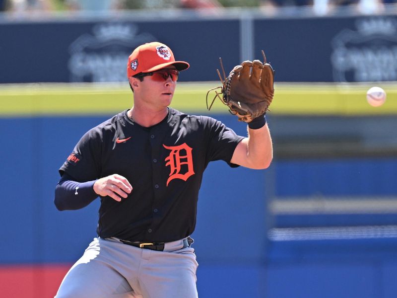 Mar 15, 2024; Dunedin, Florida, USA; Detroit Tigers second baseman Colt Keith (33) fields a ground ball in the second inning of a spring training game against the Toronto Blue Jays at TD Ballpark. Mandatory Credit: Jonathan Dyer-USA TODAY Sports