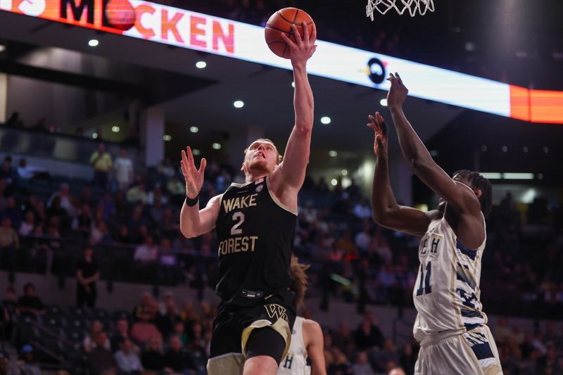 Feb 6, 2024; Atlanta, Georgia, USA; Wake Forest Demon Deacons guard Cameron Hildreth (2) shoots against the Georgia Tech Yellow Jackets in the first half at McCamish Pavilion. Mandatory Credit: Brett Davis-USA TODAY Sports