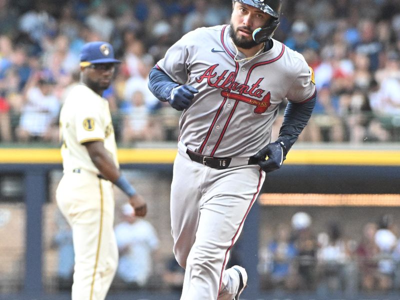 Jul 31, 2024; Milwaukee, Wisconsin, USA;  Atlanta Braves catcher Travis d'Arnaud (16) rounds the bases after hitting a home run against the Milwaukee Brewers in the fourth inning at American Family Field. Mandatory Credit: Michael McLoone-USA TODAY Sports