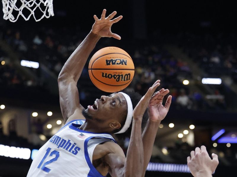 Mar 17, 2023; Columbus, OH, USA; Memphis Tigers forward DeAndre Williams (12) and forward Malcolm Dandridge (23) attempt to collect a rebound in the second half against the Florida Atlantic Owls at Nationwide Arena. Mandatory Credit: Rick Osentoski-USA TODAY Sports