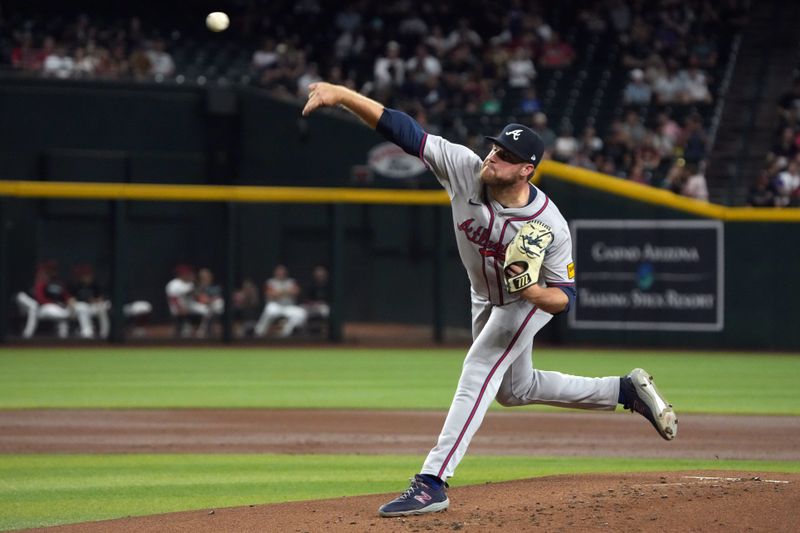 Jul 8, 2024; Phoenix, Arizona, USA; Atlanta Braves pitcher Bryce Elder (55) throws against the Arizona Diamondbacks in the first inning at Chase Field. Mandatory Credit: Rick Scuteri-USA TODAY Sports