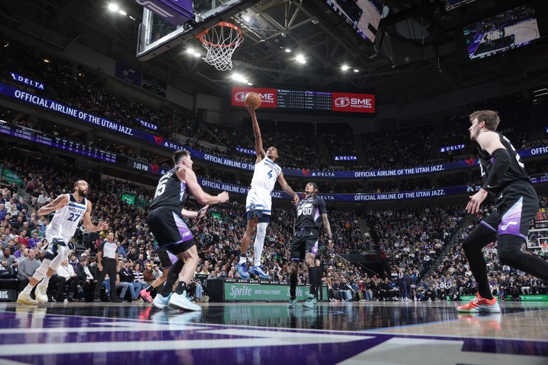 SALT LAKE CITY, UT - JANUARY 30:  Rob Dillingham #4 of the Minnesota Timberwolves shoots the ball during the game against the Utah Jazz on January 30, 2025 at Delta Center in Salt Lake City, Utah. NOTE TO USER: User expressly acknowledges and agrees that, by downloading and or using this Photograph, User is consenting to the terms and conditions of the Getty Images License Agreement. Mandatory Copyright Notice: Copyright 2025 NBAE (Photo by Melissa Majchrzak/NBAE via Getty Images)