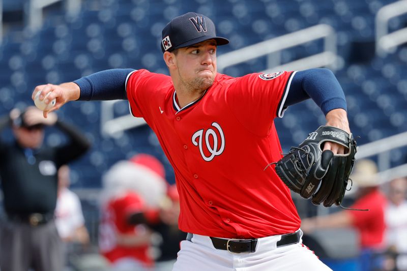 Feb 26, 2025; West Palm Beach, Florida, USA; Washington Nationals pitcher Jackson Rutledge (79) throws a pitch during the fourth inning against the Houston Astros at CACTI Park of the Palm Beaches. Mandatory Credit: Reinhold Matay-Imagn Images