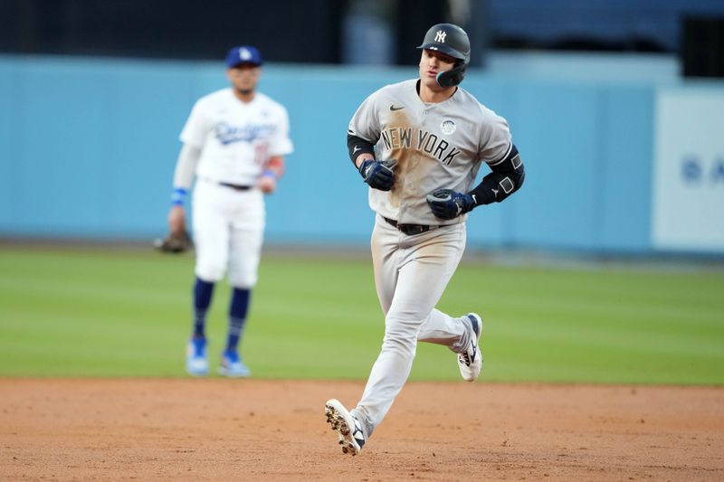 Jun 2, 2023; Los Angeles, California, USA; New York Yankees third baseman Josh Donaldson (28) rounds the bases after hitting a solo home run in the second inning against the Los Angeles Dodgers at Dodger Stadium. Mandatory Credit: Kirby Lee-USA TODAY Sports