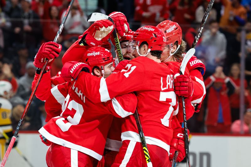 Oct 18, 2023; Detroit, Michigan, USA; Detroit Red Wings left wing David Perron (57) receives congratulations from teammates after scoring in the second period against the Pittsburgh Penguins at Little Caesars Arena. Mandatory Credit: Rick Osentoski-USA TODAY Sports