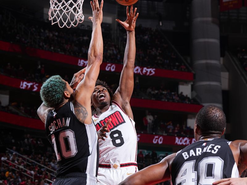 HOUSTON, TX - FEBRUARY 26:  Jae'Sean Tate #8 of the Houston Rockets shoots the ball during the game against the San Antonio Spurs on February 26, 2025 at the Toyota Center in Houston, Texas. NOTE TO USER: User expressly acknowledges and agrees that, by downloading and or using this photograph, User is consenting to the terms and conditions of the Getty Images License Agreement. Mandatory Copyright Notice: Copyright 2025 NBAE (Photo by Garrett Ellwood/NBAE via Getty Images)