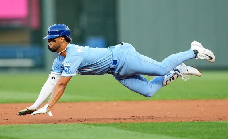 Aug 11, 2023; Kansas City, Missouri, USA; Kansas City Royals left fielder MJ Melendez (1) slides into second base for a double during the first inning against the St. Louis Cardinals at Kauffman Stadium. Mandatory Credit: Jay Biggerstaff-USA TODAY Sports