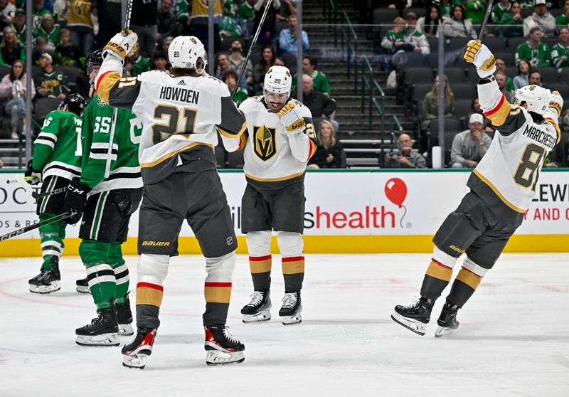 Dec 9, 2023; Dallas, Texas, USA; Vegas Golden Knights center Brett Howden (21) and center Chandler Stephenson (20) and right wing Jonathan Marchessault (81) celebrates a goal scored by Stephenson against the Dallas Stars during the first period at the American Airlines Center. Mandatory Credit: Jerome Miron-USA TODAY Sports