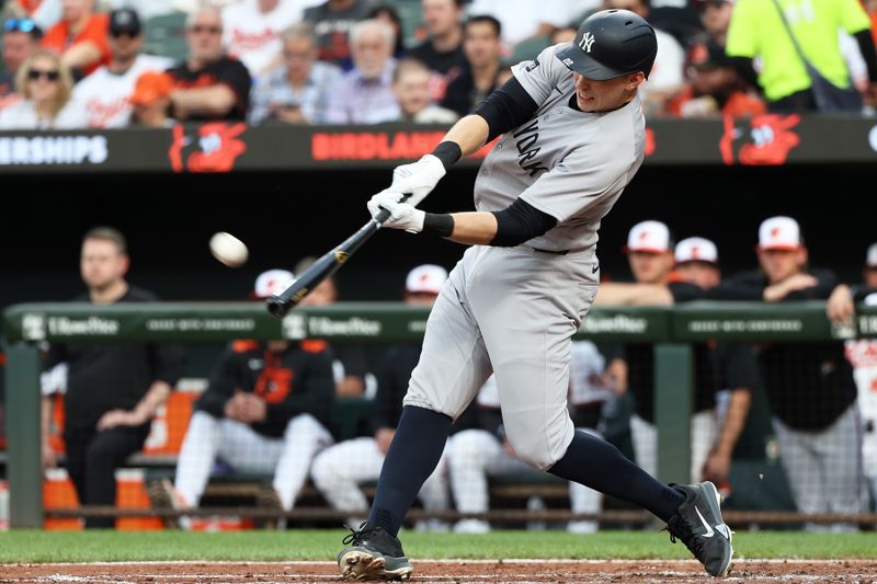 Apr 29, 2025; Baltimore, Maryland, USA; New York Yankees first baseman Ben Rice (22) hits a home run during the second inning against the Baltimore Orioles at Oriole Park at Camden Yards. Mandatory Credit: Daniel Kucin Jr.-Imagn Images