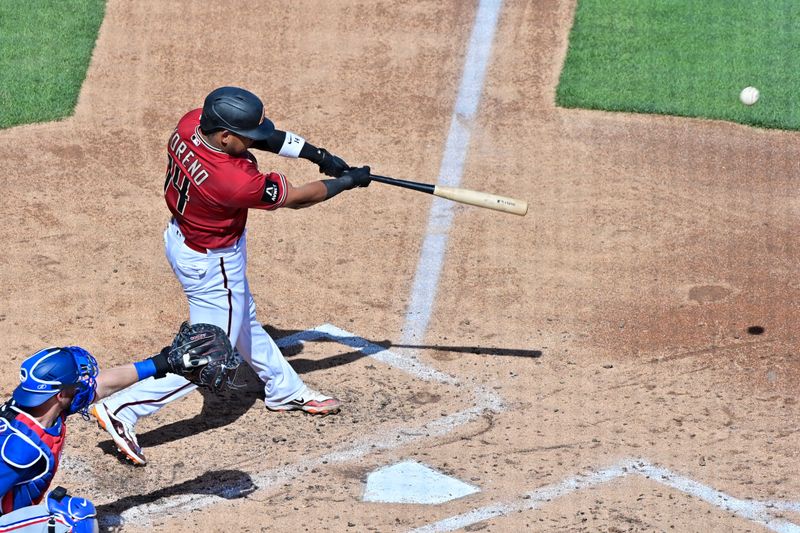 Mar 8, 2023; Salt River Pima-Maricopa, Arizona, USA; Arizona Diamondbacks catcher Gabriel Moreno (14) flies out in the third inning against the Texas Rangers during a Spring Training game at Salt River Fields at Talking Stick. Mandatory Credit: Matt Kartozian-USA TODAY Sports