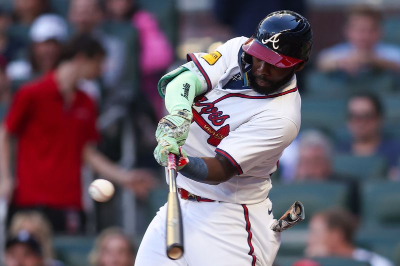 May 12, 2025; Atlanta, Georgia, USA; Atlanta Braves center fielder Michael Harris II (23) hits an RBI single against the Washington Nationals in the third inning at Truist Park. Mandatory Credit: Brett Davis-Imagn Images
