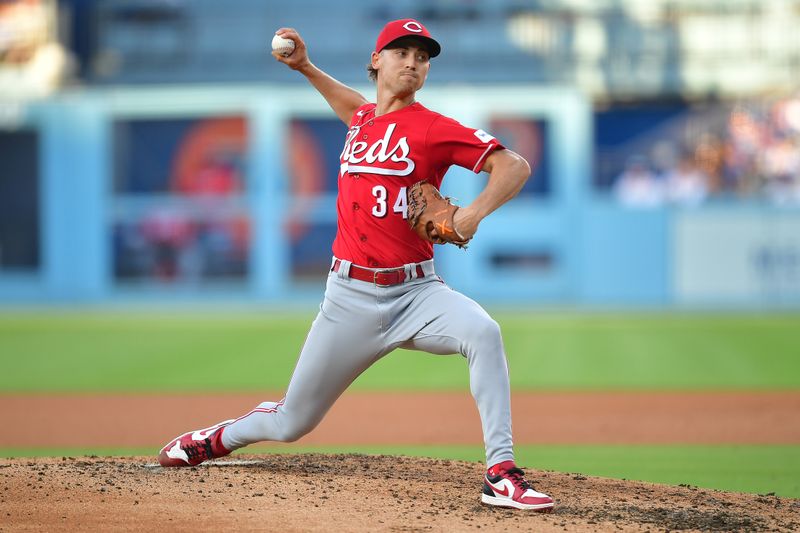 Jul 29, 2023; Los Angeles, California, USA; Cincinnati Reds starting pitcher Luke Weaver (34) throws against the Los Angeles Dodgers during the third inning at Dodger Stadium. Mandatory Credit: Gary A. Vasquez-USA TODAY Sports