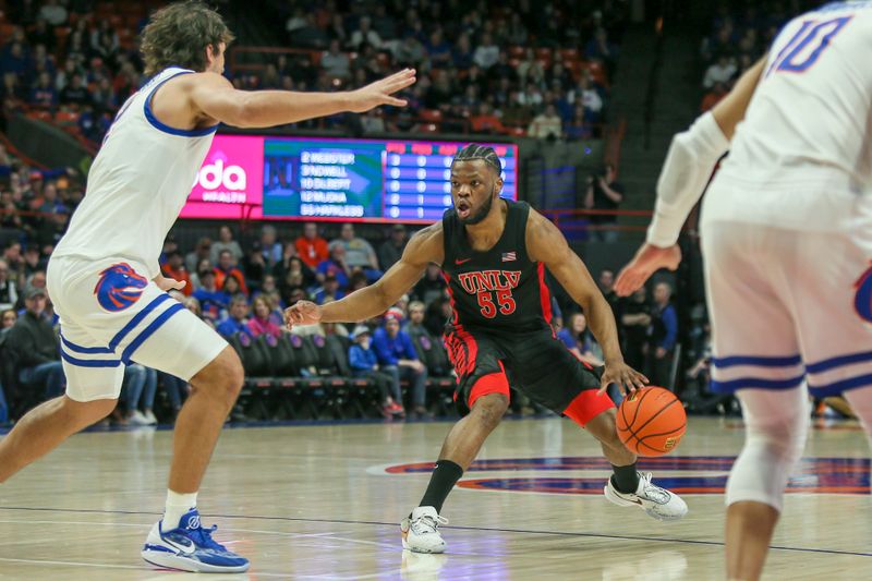 Feb 19, 2023; Boise, Idaho, USA; UNLV Rebels guard EJ Harkless (55) dribbles during the first half against the Boise State Broncos at ExtraMile Arena. Mandatory Credit: Brian Losness-USA TODAY Sports
