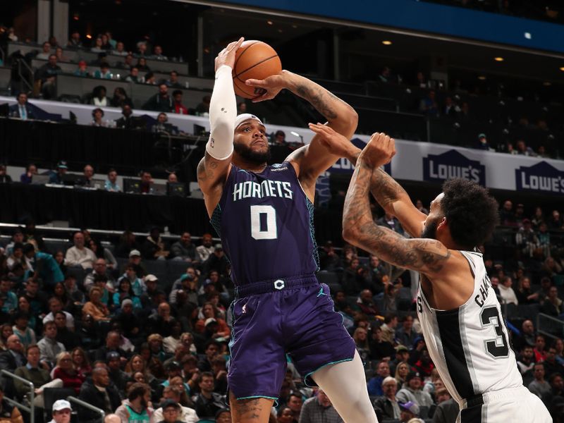 CHARLOTTE, NC - JANUARY 19: Miles Bridges #0 of the Charlotte Hornets shoots the ball during the game against the San Antonio Spurs on January 19, 2024 at Spectrum Center in Charlotte, North Carolina. NOTE TO USER: User expressly acknowledges and agrees that, by downloading and or using this photograph, User is consenting to the terms and conditions of the Getty Images License Agreement. Mandatory Copyright Notice: Copyright 2024 NBAE (Photo by Kent Smith/NBAE via Getty Images)