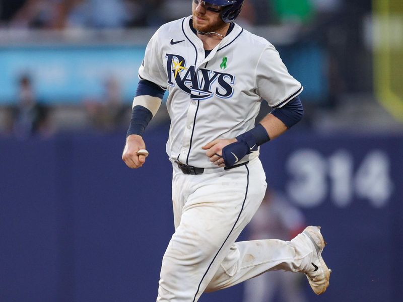 May 19, 2025; Tampa, Florida, USA; Tampa Bay Rays catcher Danny Jansen (19) runs the bases after hitting a two run home run against the Houston Astros in the fifth inning at George M. Steinbrenner Field. Mandatory Credit: Nathan Ray Seebeck-Imagn Images