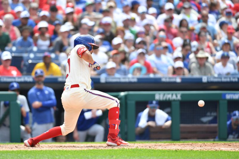 Jun 11, 2023; Philadelphia, Pennsylvania, USA; Philadelphia Phillies catcher Garrett Stubbs (21) his an RBI burst single against the Los Angeles Dodgers during the sixth inning at Citizens Bank Park. Mandatory Credit: Eric Hartline-USA TODAY Sports