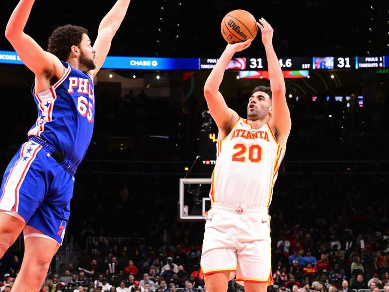 ATLANTA, GA - MARCH 10: Georges Niang #20 of the Atlanta Hawks shoots the ball during the game against the Philadelphia 76ers on March 10, 2025 at State Farm Arena in Atlanta, Georgia.  NOTE TO USER: User expressly acknowledges and agrees that, by downloading and/or using this Photograph, user is consenting to the terms and conditions of the Getty Images License Agreement. Mandatory Copyright Notice: Copyright 2025 NBAE(Photo by Adam Hagy/NBAE via Getty Images)