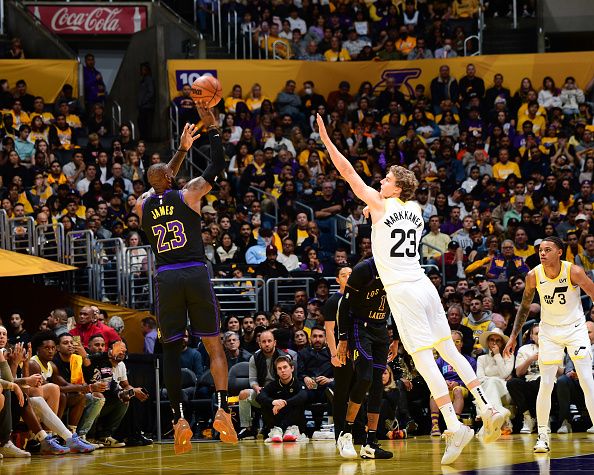 LOS ANGELES, CA - NOVEMBER 21:  LeBron James #23 of the Los Angeles Lakers shoots a three point basket during the game to reach 39,000 point milestone to during the in Season Tournament on November 21, 2023 at Crypto.Com Arena in Los Angeles, California. NOTE TO USER: User expressly acknowledges and agrees that, by downloading and/or using this Photograph, user is consenting to the terms and conditions of the Getty Images License Agreement. Mandatory Copyright Notice: Copyright 2023 NBAE (Photo by Adam Pantozzi/NBAE via Getty Images)