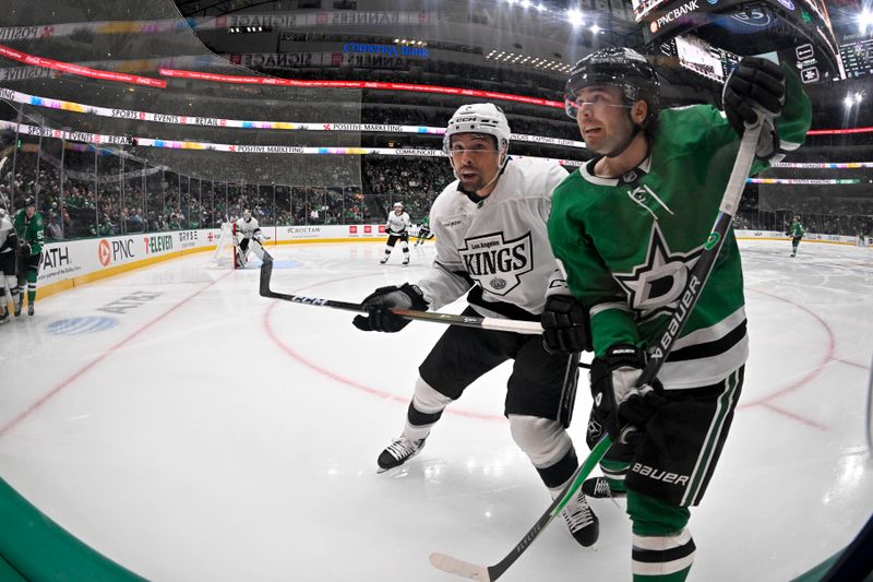 Oct 23, 2025; Dallas, Texas, USA; Los Angeles Kings defenseman Cody Ceci (5) and Dallas Stars center Mavrik Bourque (22) chase the puck during the second period at the American Airlines Center. Mandatory Credit: Jerome Miron-Imagn Images