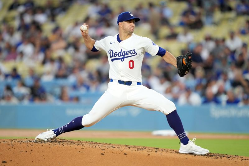 Aug 21, 2024; Los Angeles, California, USA; Los Angeles Dodgers starting pitcher Jack Flaherty (0) throws in the second inning against the Seattle Mariners  at Dodger Stadium. Mandatory Credit: Kirby Lee-USA TODAY Sports