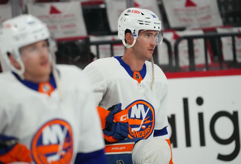 Apr 22, 2024; Raleigh, North Carolina, USA; New York Islanders left wing Pierre Engvall (18) looks on during the warmups before the game against the Carolina Hurricanes in game two of the first round of the 2024 Stanley Cup Playoffs at PNC Arena. Mandatory Credit: James Guillory-USA TODAY Sports