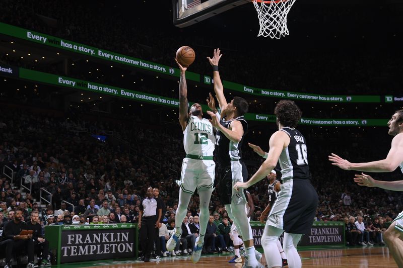 BOSTON, MA - JANUARY 17: Oshae Brissett #12 of the Boston Celtics shoots the ball during the game against the San Antonio Spurs on January 17, 2024 at the TD Garden in Boston, Massachusetts. NOTE TO USER: User expressly acknowledges and agrees that, by downloading and or using this photograph, User is consenting to the terms and conditions of the Getty Images License Agreement. Mandatory Copyright Notice: Copyright 2024 NBAE  (Photo by Brian Babineau/NBAE via Getty Images)