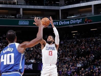 SACRAMENTO, CA - NOVEMBER 29: Paul George #13 of the LA Clippers shoots a three point basket against the Sacramento Kings on November 29, 2023 at Golden 1 Center in Sacramento, California. NOTE TO USER: User expressly acknowledges and agrees that, by downloading and or using this Photograph, user is consenting to the terms and conditions of the Getty Images License Agreement. Mandatory Copyright Notice: Copyright 2023 NBAE (Photo by Rocky Widner/NBAE via Getty Images)