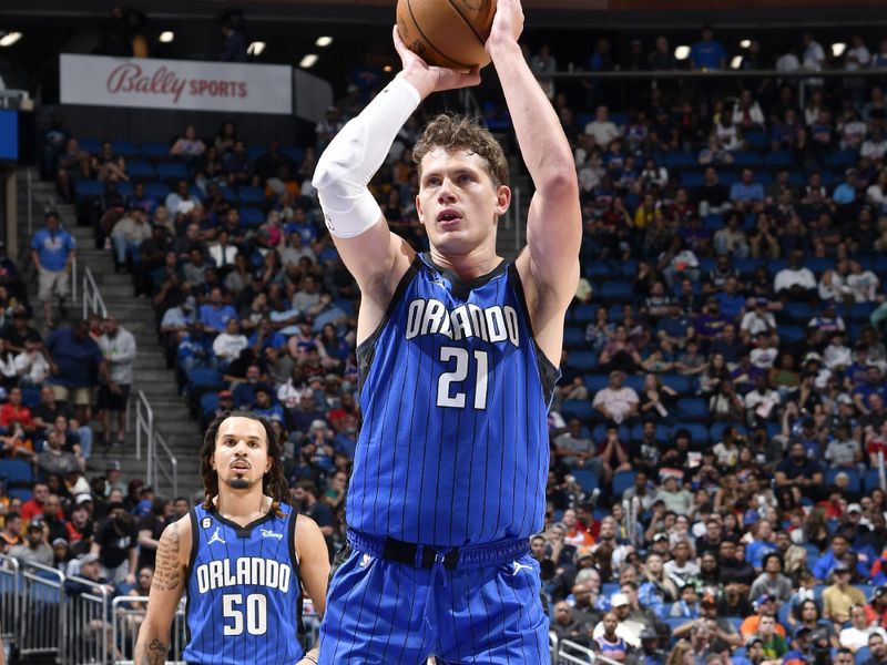 ORLANDO, FL - MARCH 23: Moritz Wagner #21 of the Orlando Magic shoots a free throw during the game against the New York Knicks on March 23, 2023 at Amway Center in Orlando, Florida. NOTE TO USER: User expressly acknowledges and agrees that, by downloading and or using this photograph, User is consenting to the terms and conditions of the Getty Images License Agreement. Mandatory Copyright Notice: Copyright 2023 NBAE (Photo by Fernando Medina/NBAE via Getty Images)