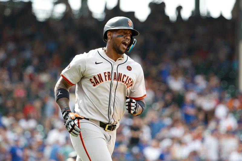 Jun 19, 2024; Chicago, Illinois, USA; San Francisco Giants designated hitter Jorge Soler (2) rounds the bases after hitting a grand slam against the Chicago Cubs during the eight inning at Wrigley Field. Mandatory Credit: Kamil Krzaczynski-USA TODAY Sports