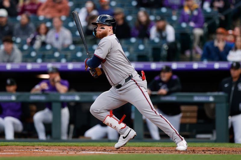 Apr 28, 2025; Denver, Colorado, USA; Atlanta Braves left fielder Alex Verdugo (8) hits an RBI single in the third inning against the Colorado Rockies at Coors Field. Mandatory Credit: Isaiah J. Downing-Imagn Images