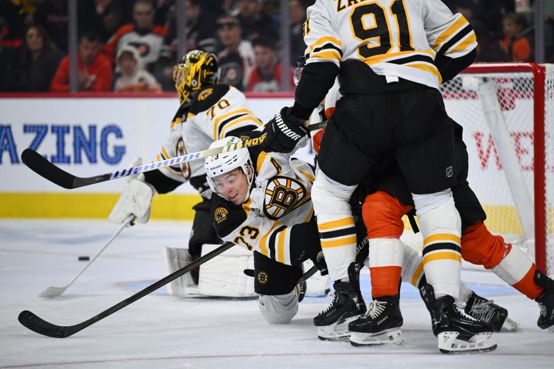 Nov 2, 2024; Philadelphia, Pennsylvania, USA; Boston Bruins defenseman Charlie McAvoy (73) reacts during a collision against the Philadelphia Flyers in the second period at Wells Fargo Center. Mandatory Credit: Kyle Ross-Imagn Images