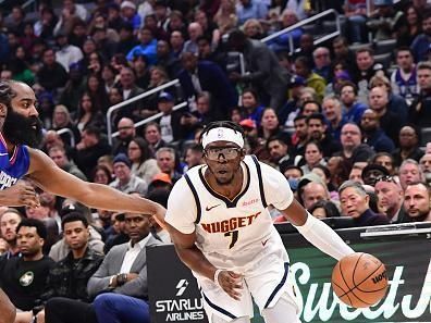 LOS ANGELES, CA - NOVEMBER 27:  Reggie Jackson #7 of the Denver Nuggets goes to the basket during the game on November 27, 2023 at Crypto.Com Arena in Los Angeles, California. NOTE TO USER: User expressly acknowledges and agrees that, by downloading and/or using this Photograph, user is consenting to the terms and conditions of the Getty Images License Agreement. Mandatory Copyright Notice: Copyright 2023 NBAE (Photo by Adam Pantozzi/NBAE via Getty Images)