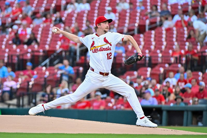 Sep 19, 2024; St. Louis, Missouri, USA;  St. Louis Cardinals starting pitcher Erick Fedde (12) pitches against the Pittsburgh Pirates during the first inning at Busch Stadium. Mandatory Credit: Jeff Curry-Imagn Images