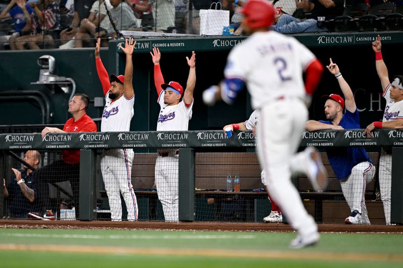 Jun 30, 2025; Arlington, Texas, USA; The Texas Rangers bench celebrates as second baseman Marcus Semien (2) rounds the bases after he hits a two run home run against the Baltimore Orioles during the sixth inning at Globe Life Field. Mandatory Credit: Jerome Miron-Imagn Images