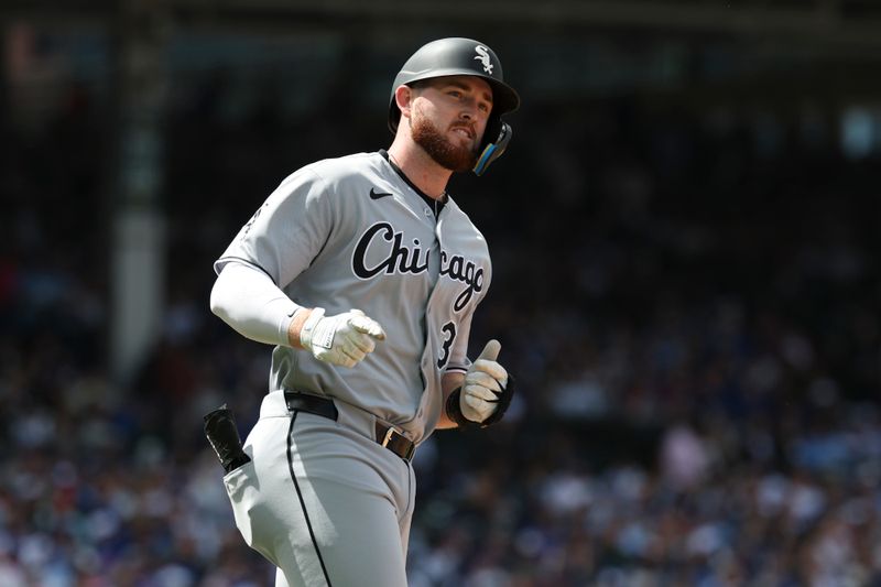 May 17, 2025; Chicago, Illinois, USA; Chicago White Sox first baseman Tim Elko (30) rounds the bases after hitting a solo home run against the Chicago Cubs during the fifth inning at Wrigley Field. Mandatory Credit: Kamil Krzaczynski-Imagn Images