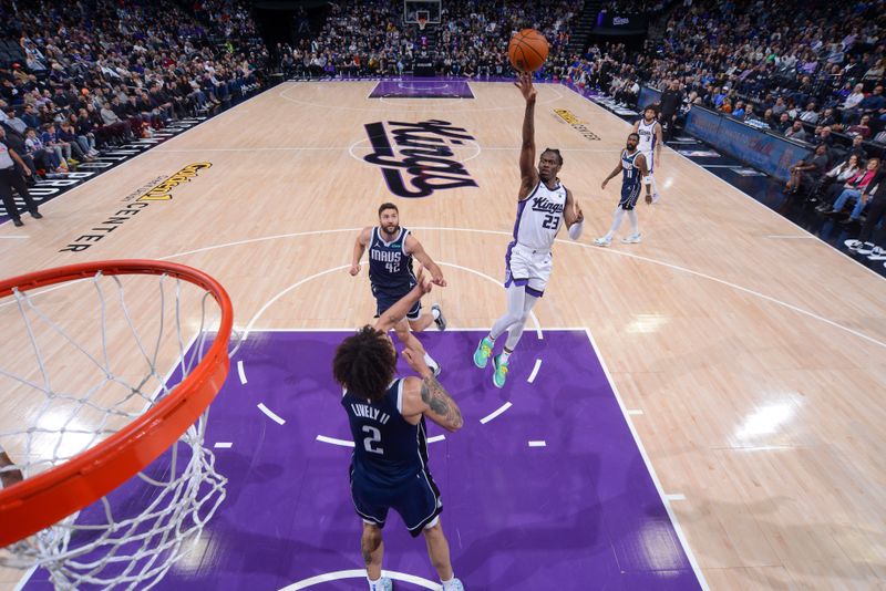 SACRAMENTO, CA - MARCH 29:  Keon Ellis #23 of the Sacramento Kings goes to the basket during the game on March 29, 2024 at Golden 1 Center in Sacramento, California. NOTE TO USER: User expressly acknowledges and agrees that, by downloading and or using this Photograph, user is consenting to the terms and conditions of the Getty Images License Agreement. Mandatory Copyright Notice: Copyright 2024 NBAE (Photo by Rocky Widner/NBAE via Getty Images)