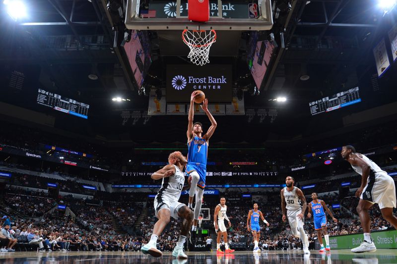SAN ANTONIO, TX - OCTOBER 7: Chet Holmgren #7 of the Oklahoma City Thunder drives to the basket during the game against the San Antonio Spurs during a NBA preseason game on October 7, 2024 at the Frost Bank Center in San Antonio, Texas. NOTE TO USER: User expressly acknowledges and agrees that, by downloading and or using this photograph, user is consenting to the terms and conditions of the Getty Images License Agreement. Mandatory Copyright Notice: Copyright 2024 NBAE (Photos by Michael Gonzales/NBAE via Getty Images)